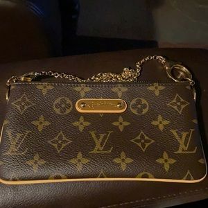 Louis Vuitton small leather good pouch with chain